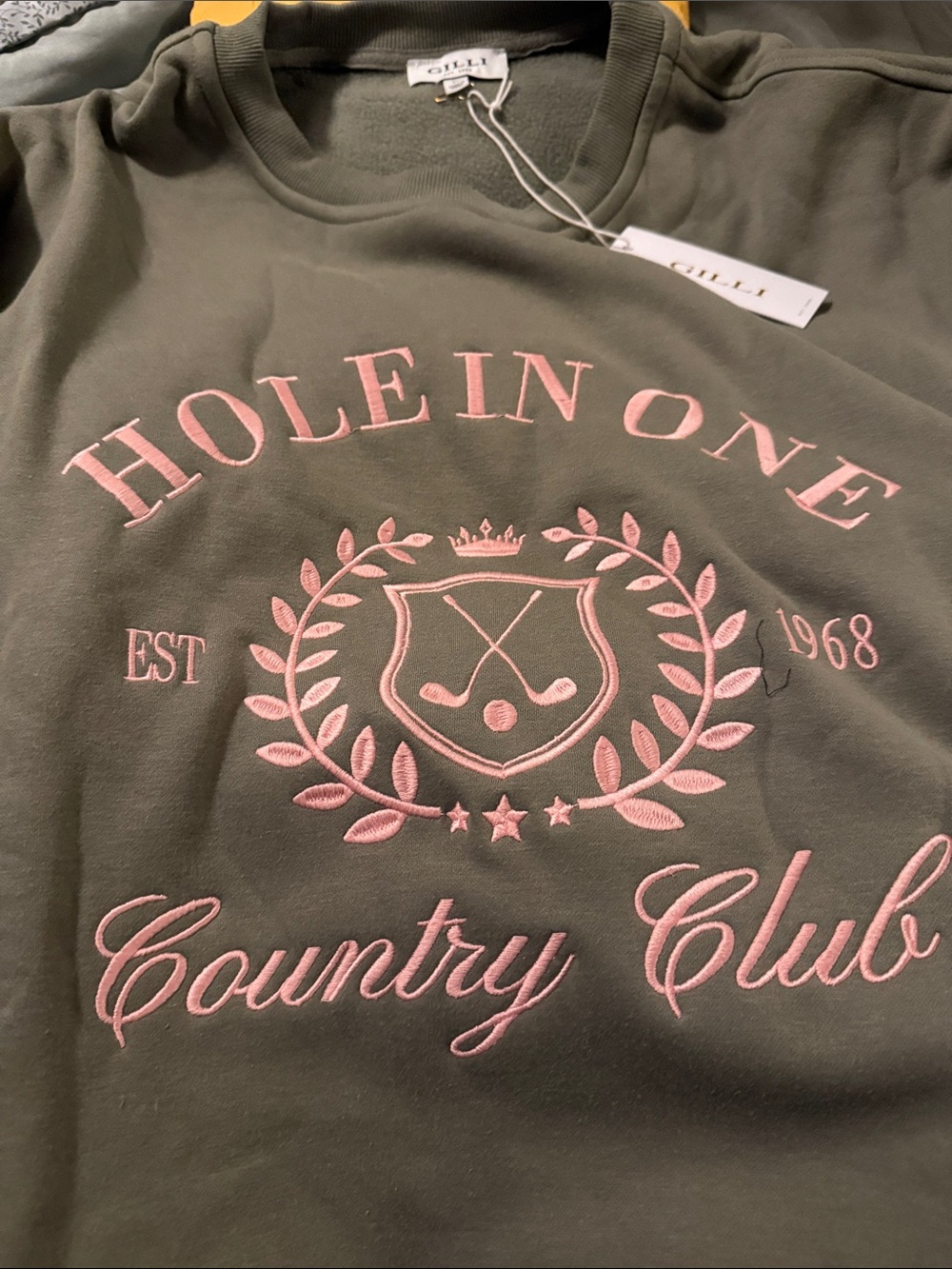 Gilli Olive Green Sweatshirt with Pink 'Hole In One Country Club' Embroidery